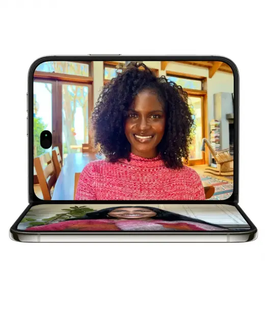 iPhone 18 Duo showcasing a woman with curly hair in a pink sweater during a video call.